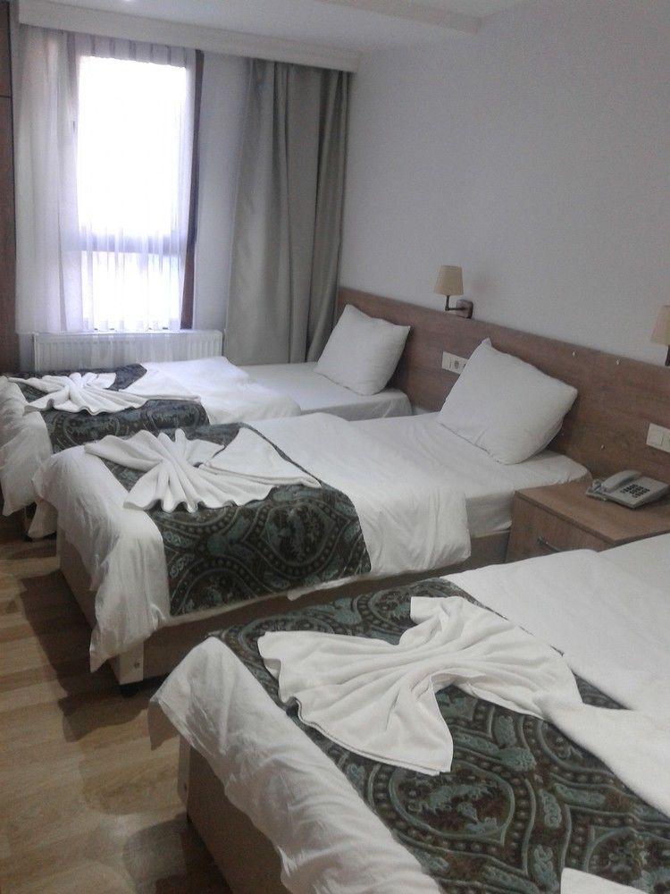 Rozza Hotel Istambul Exterior foto A room at the hotel