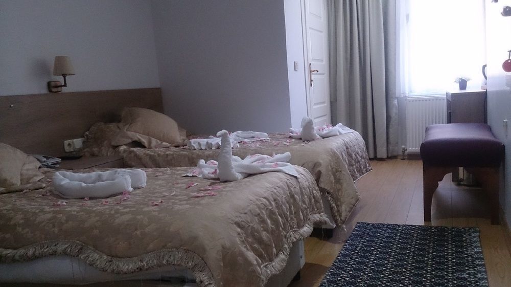 Rozza Hotel Istambul Exterior foto A room at the hotel