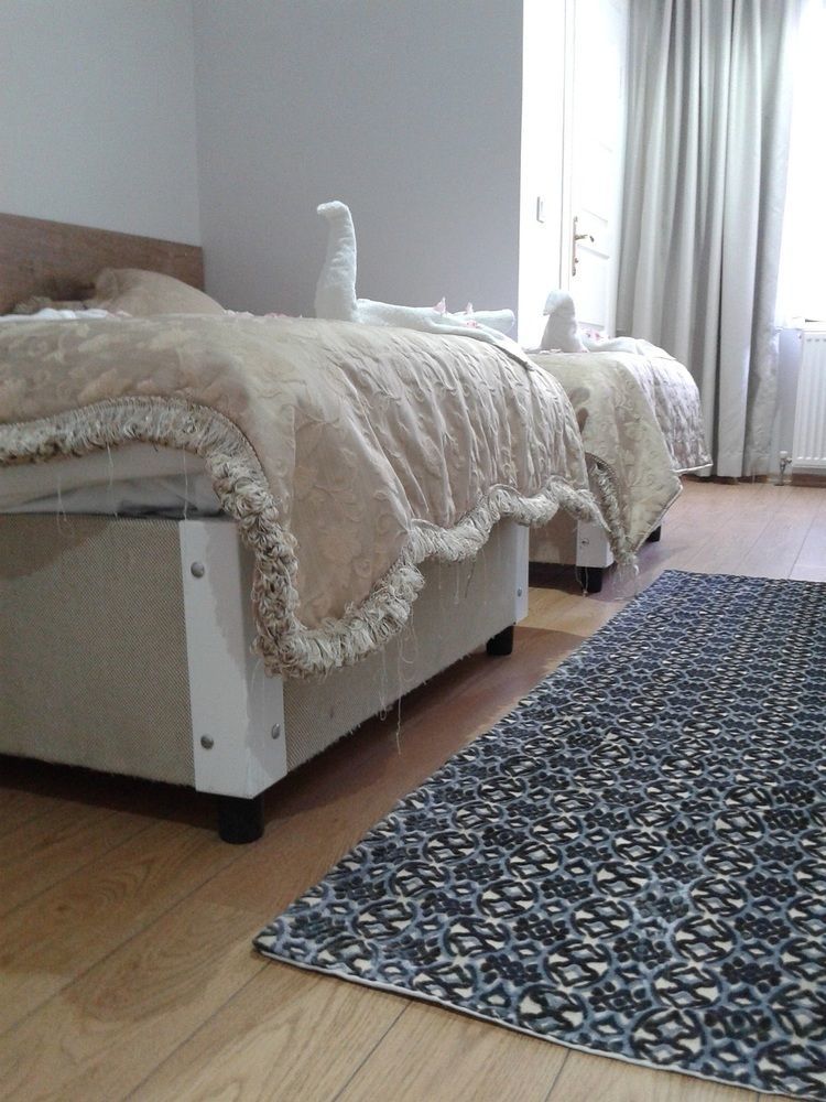 Rozza Hotel Istambul Exterior foto A bed with a duvet